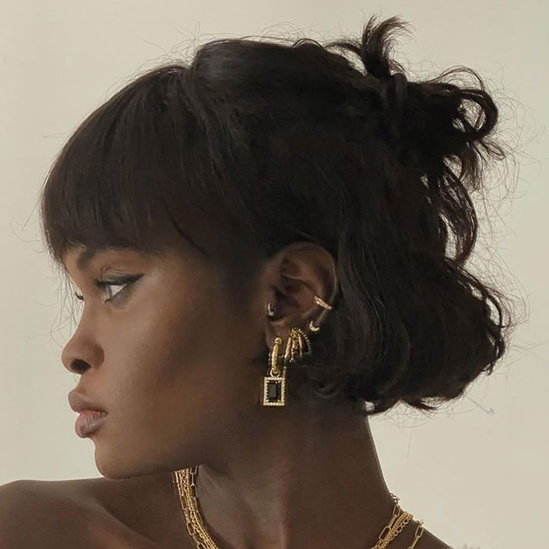 Black Bob With Messy Top Knot Black Bob With Messy Top Knot — Half Up Half Down Short Hair