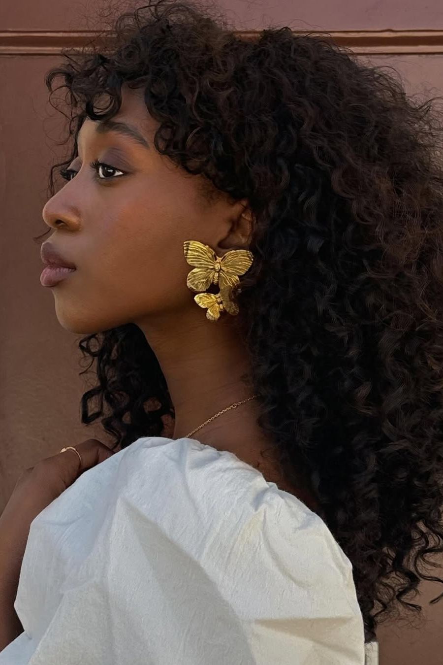 Black Butterfly Mid-Back With Defined Curls — Butterfly Haircut Curly Hair
