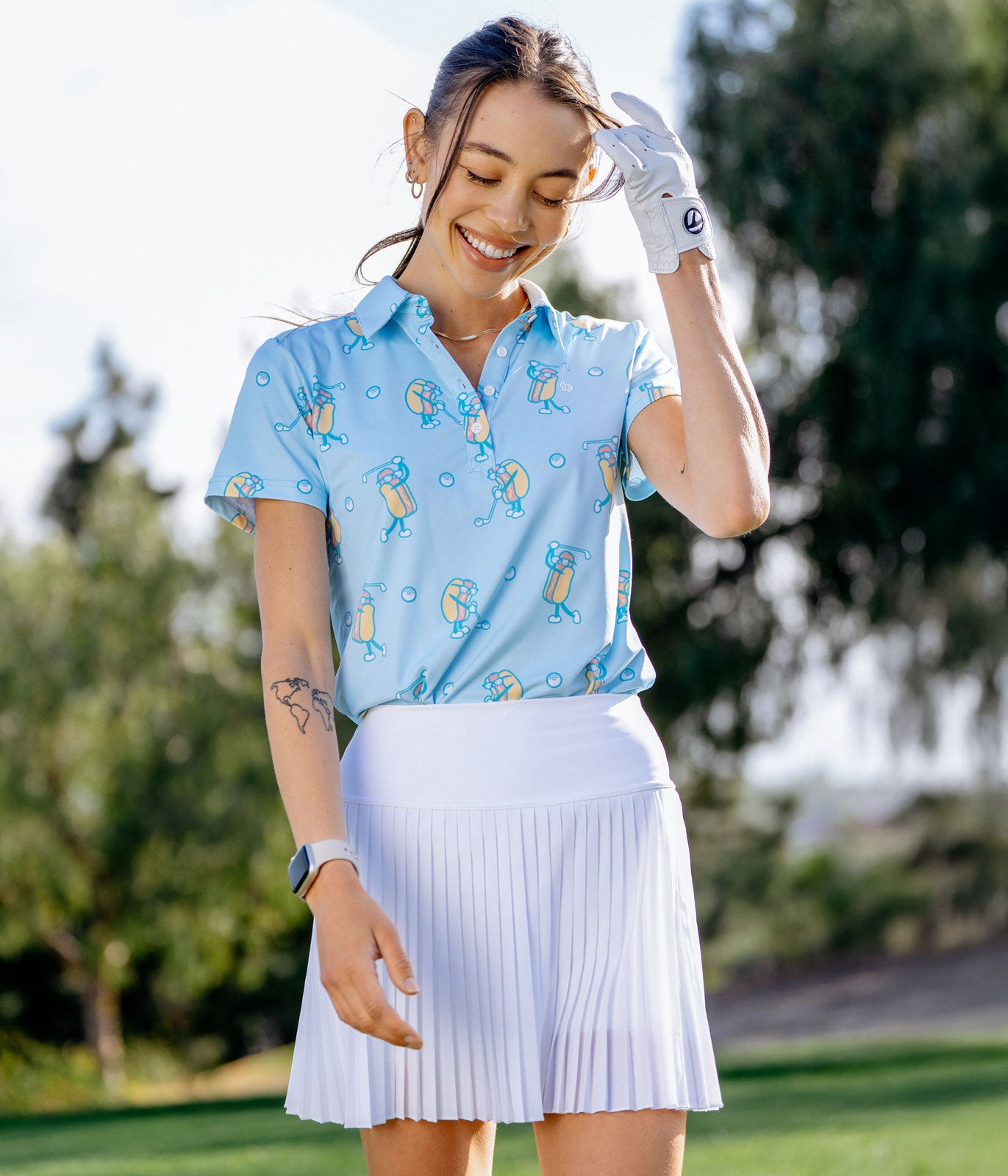 Sporty Style: Printed Polo with Pleated Skirt Sporty Style: Printed Polo with Pleated Skirt — Polo Shirt Outfits Women
