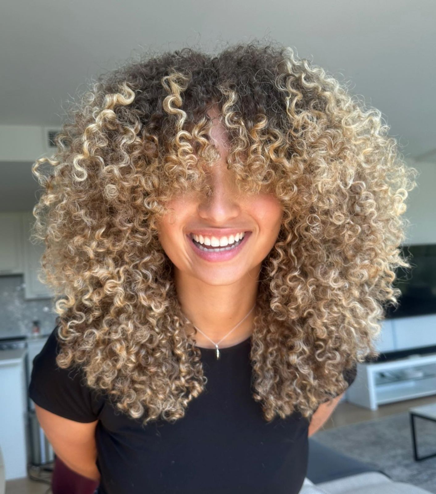 Full Bangs Visual Idea — Balayage Curly Hair