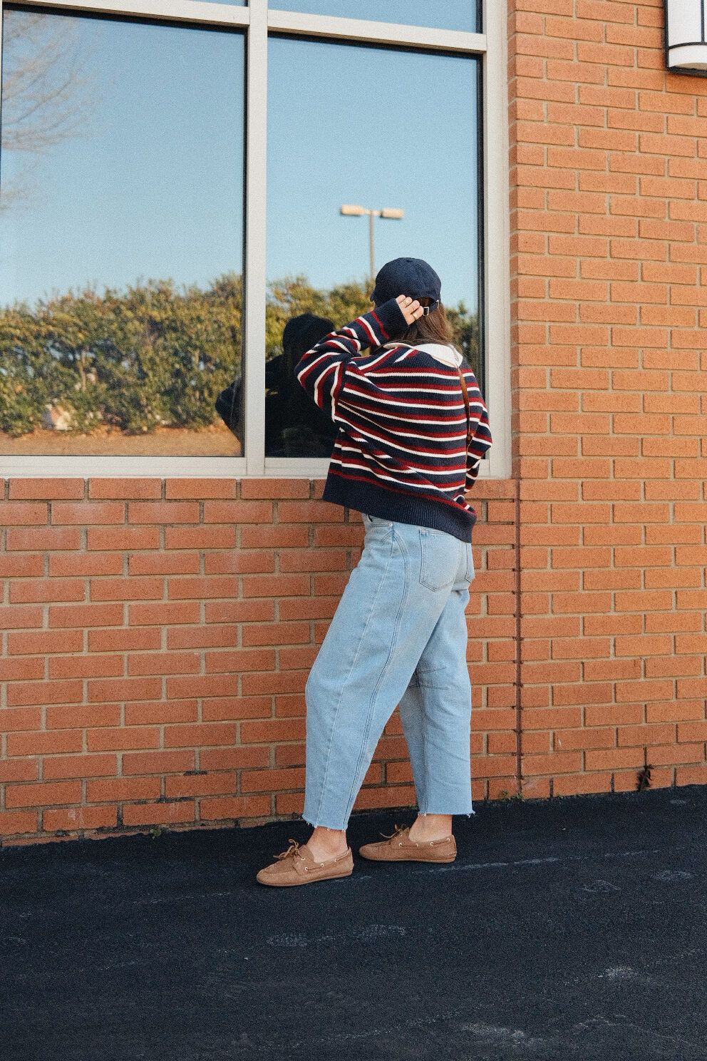 Relaxed Comfort: Relaxed Fit Jeans with a Striped Sweater — Light Wash Jeans Outfits