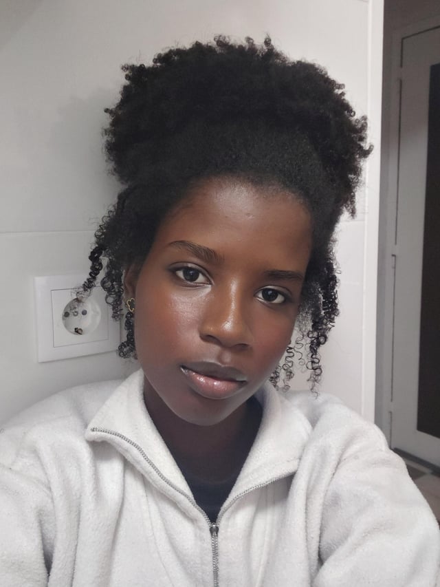 Voluminous Coily Messy Bun
