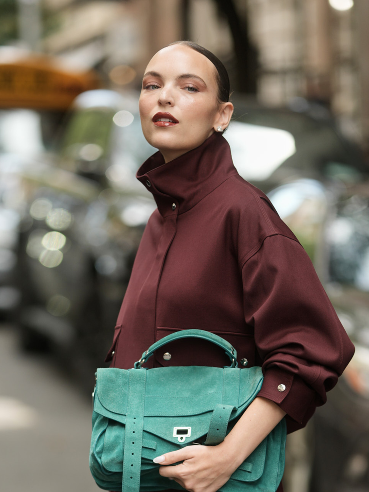 Statement Jacket: Maroon High-Neck with Teal Handbag — It Girl Outfits