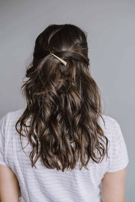 Shoulder-Length Twist With Gold Clip — Half Up Half Down Wavy Hair