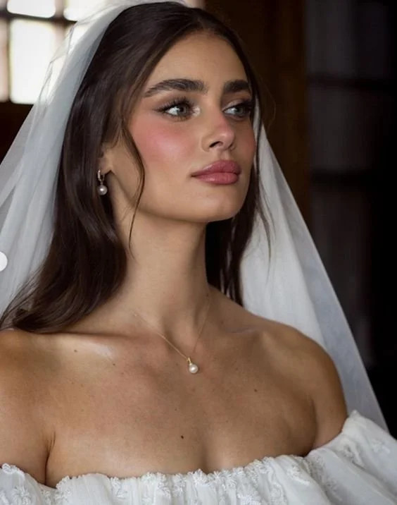 Loose Flowing Waves with Side-Swept Bangs Loose Flowing Waves with Side-Swept Bangs — Wedding Hairstyles with Veil