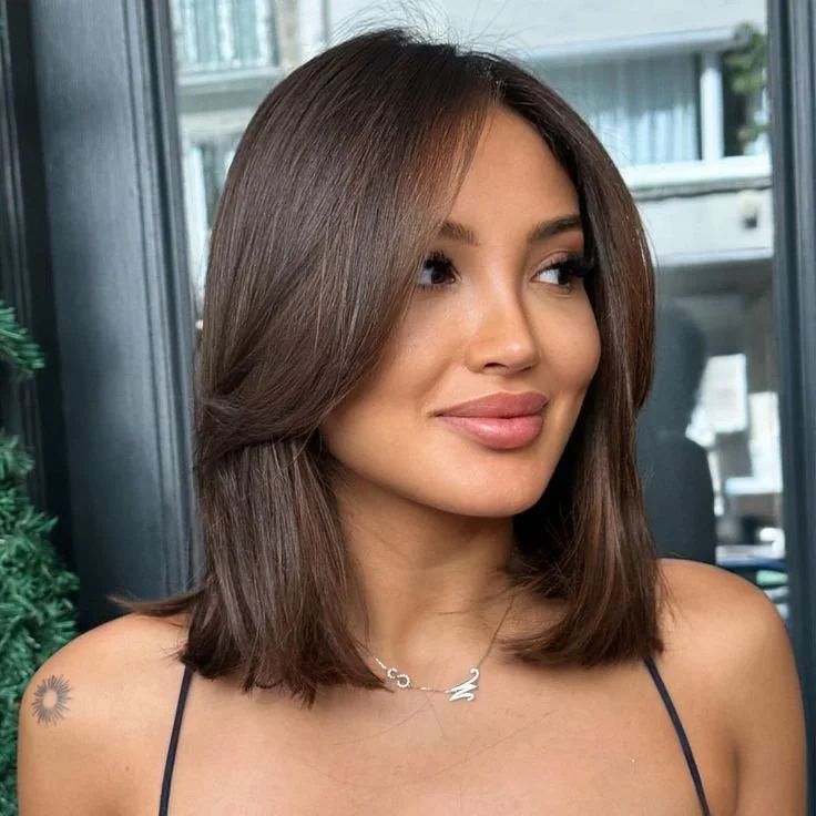 Dark Brown Layered Lob With Curtain Bangs — Family Photo Hairstyles