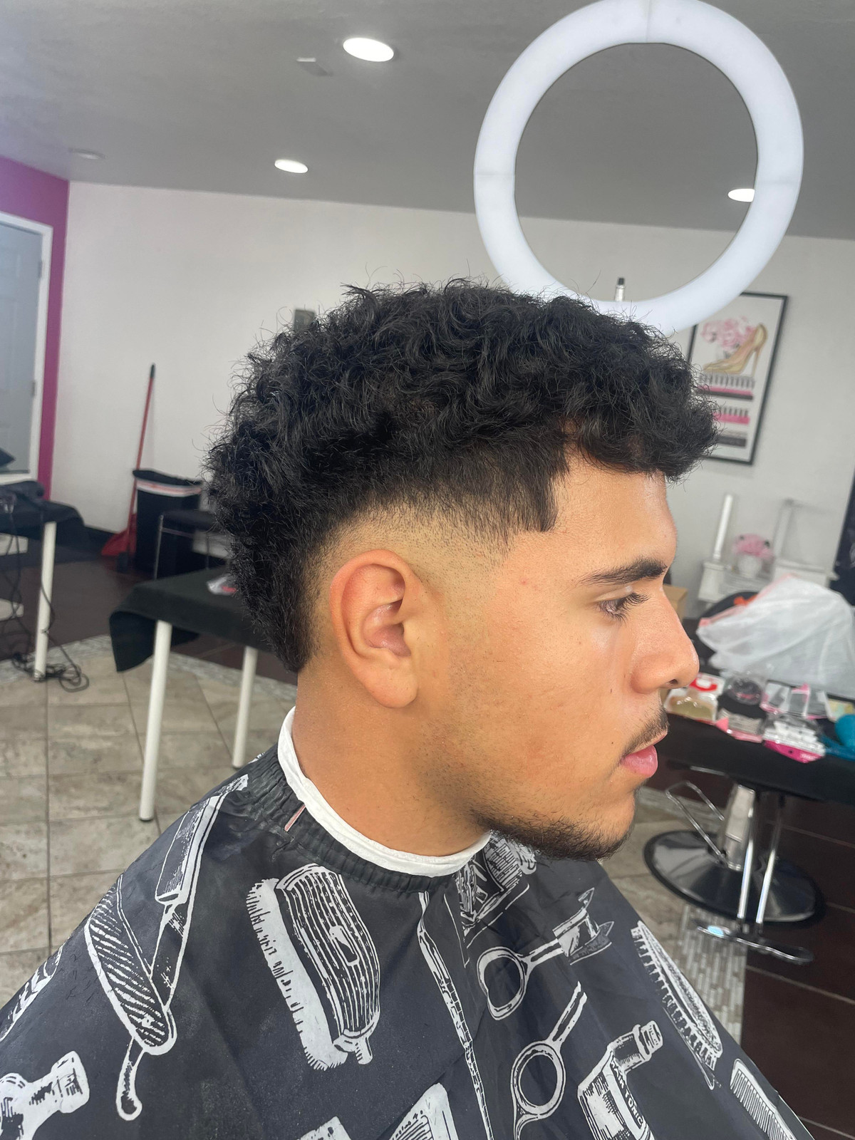Thick Curly Mohawk And Burst Fade Contrast