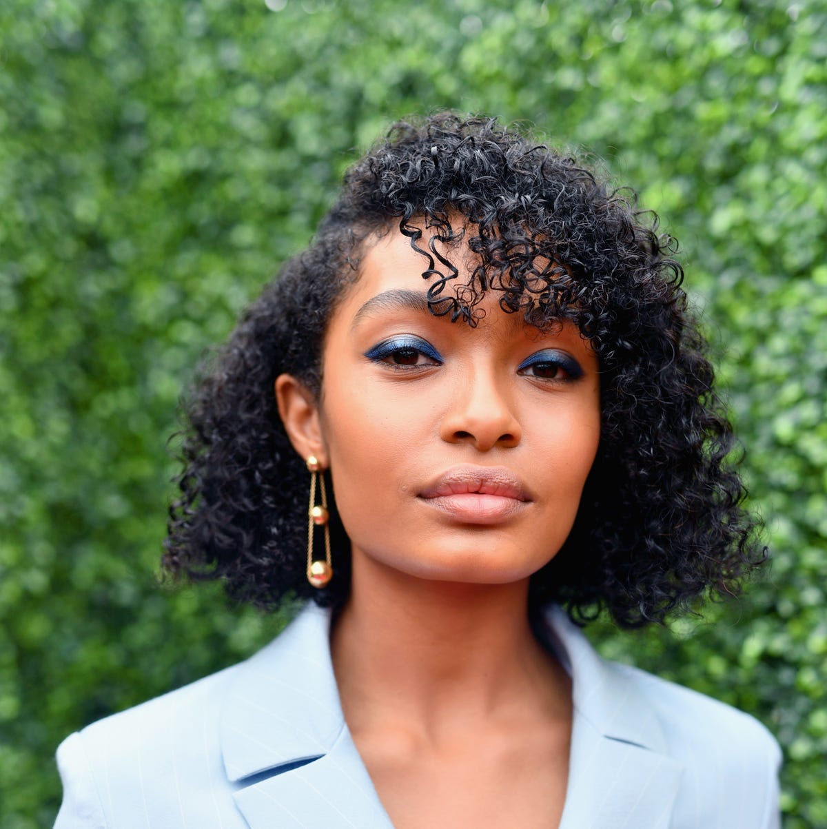 Platinum Blonde Cropped Curls With Undercut — Curly Hairstyles