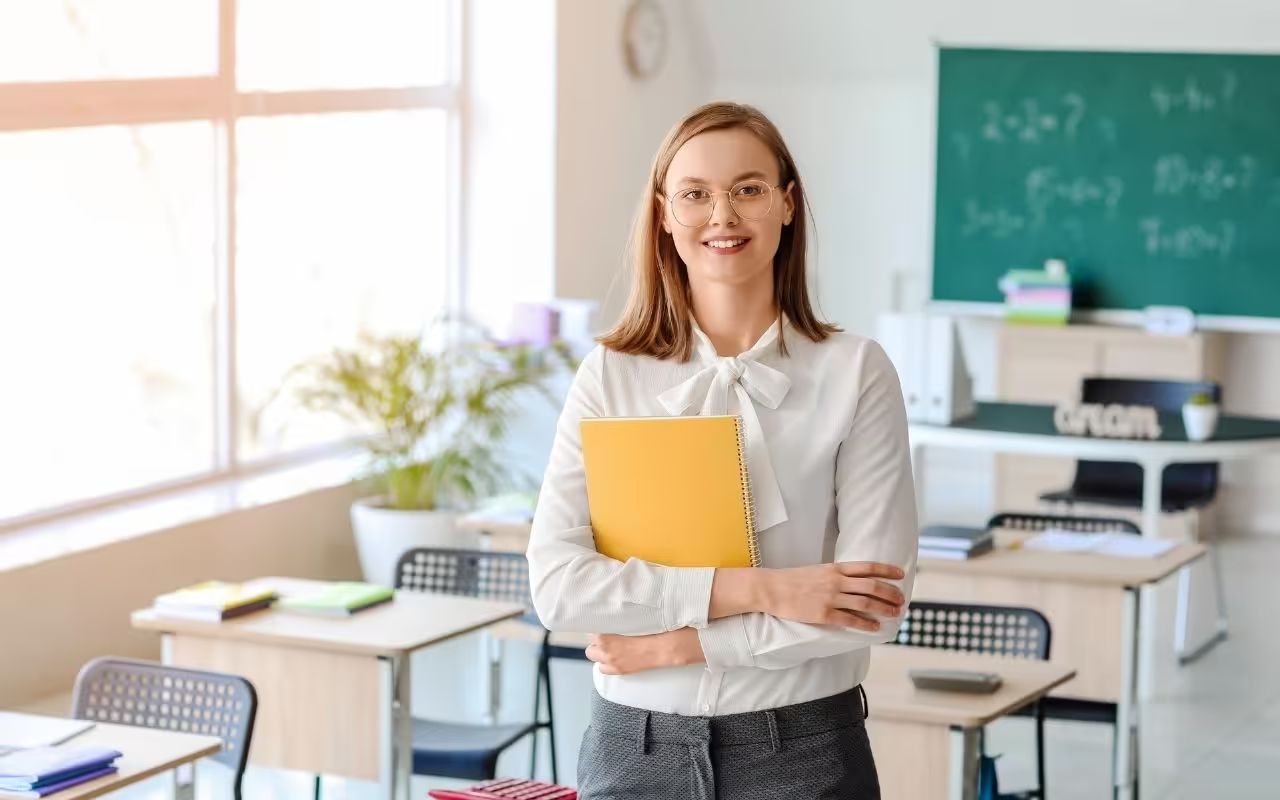 Polished Professionalism: Bow-Neck Blouse with Grey Trousers Polished Professionalism: Bow-Neck Blouse with Grey Trousers — Substitute Teacher Outfits
