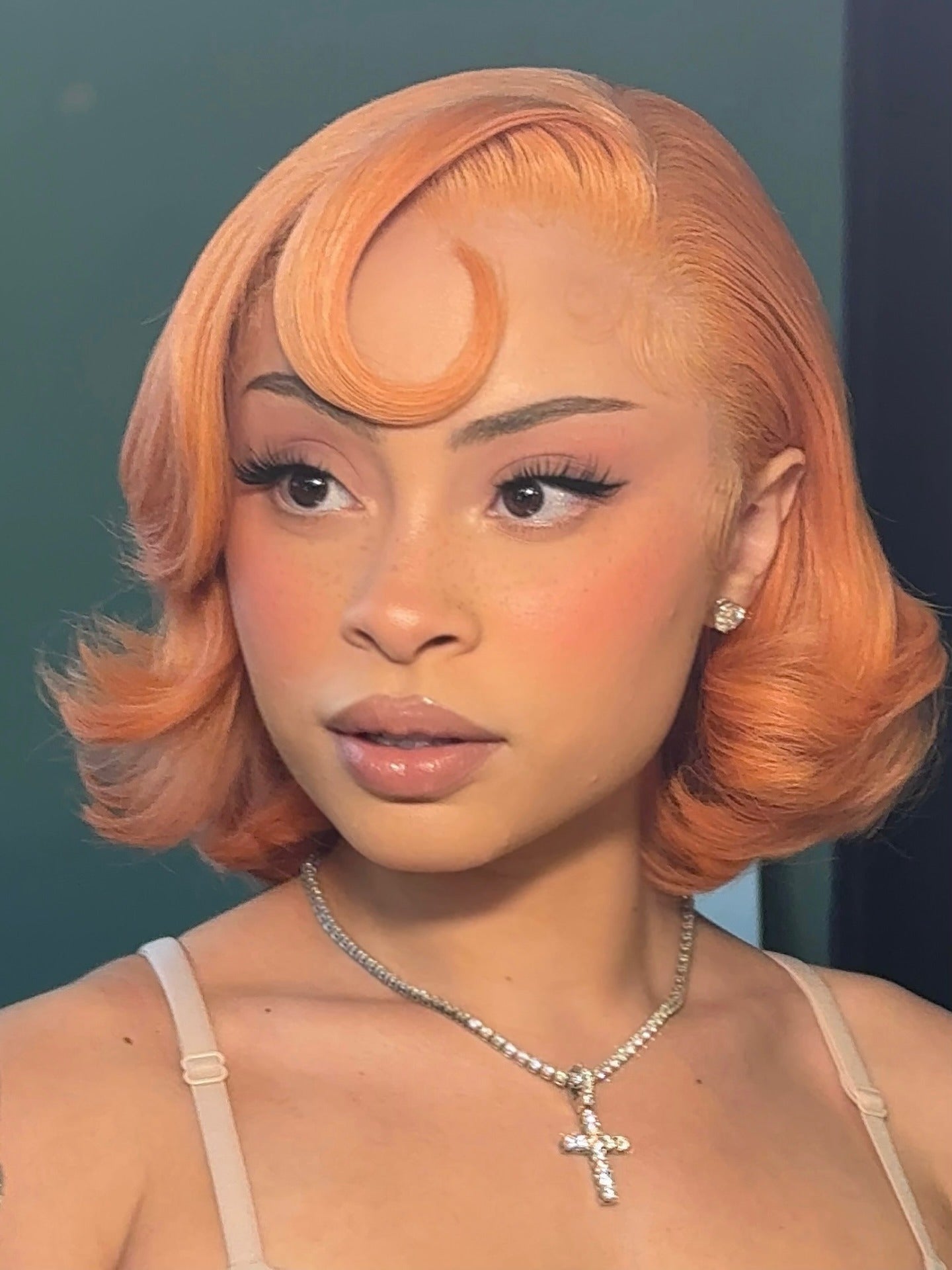Vibrant Orange Bob With Vintage Waves — Baddie Hairstyles