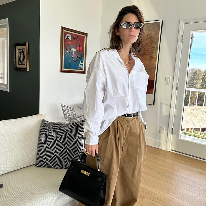 Oversized White Button-Up with Tan Trousers and Black Accents Oversized White Button-Up with Tan Trousers and Black Accents — Button Up Shirt Outfits