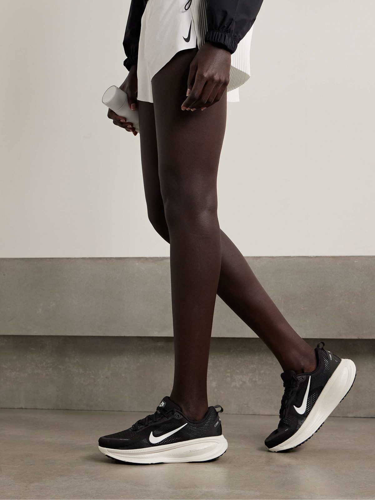 Performance Focus: Sleek Black and White Running Shoes — Nike Vomero Outfits