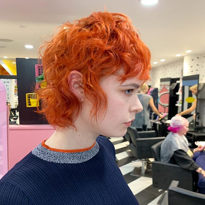 Vibrant Orange Curly Short Wolf Cut