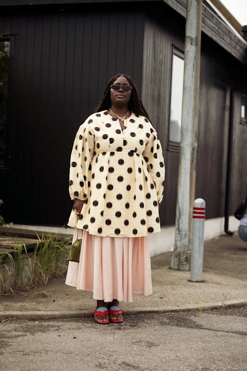 Playful Polka Dot Dress Over Pleated Skirt Playful Polka Dot Dress Over Pleated Skirt — Copenhagen Outfits