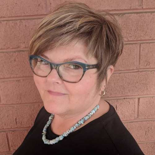 Pixie With Long Side-Swept Bangs — Haircuts for Women Over 50 with Glasses
