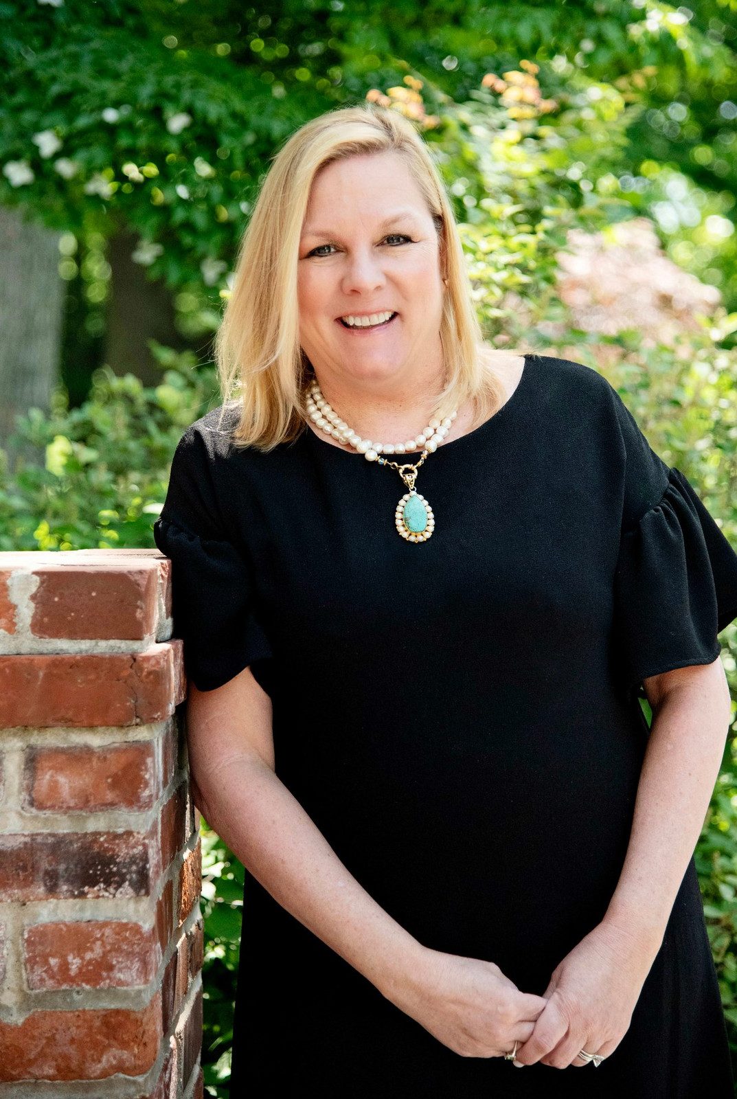 Black Dress with Statement Pearl Necklace Black Dress with Statement Pearl Necklace — Real Estate Agent Outfits