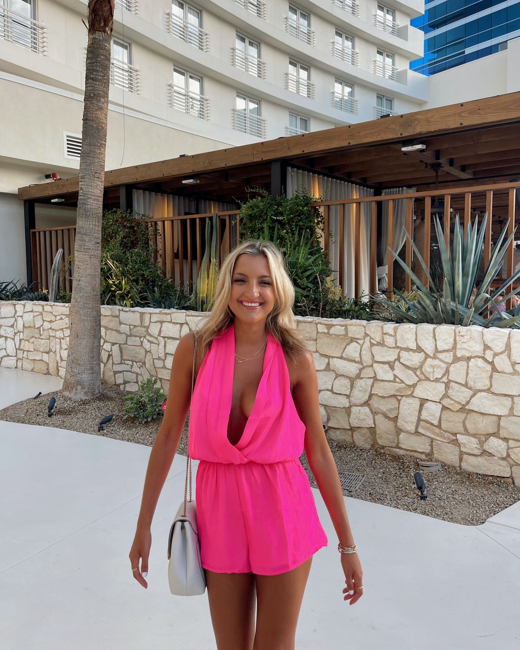 Hot Pink Romper with White Sneakers for Daytime Vegas — Vegas Club Outfits