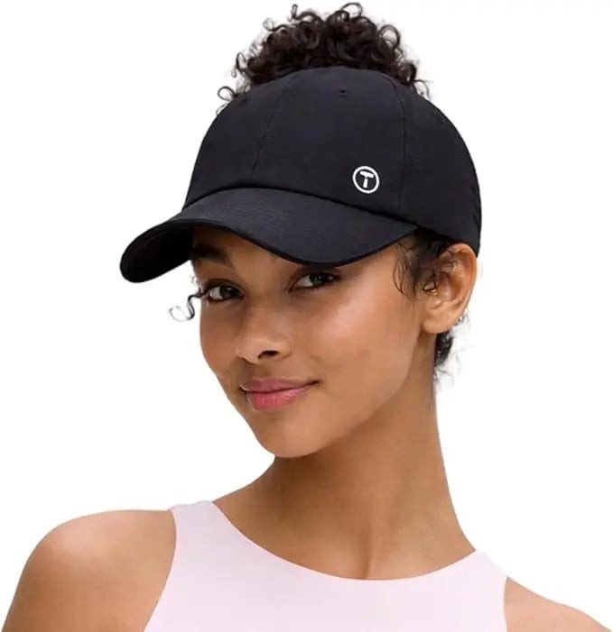 High Bun With Subtle Highlights High Bun With Subtle Highlights — Baseball Cap Hairstyles