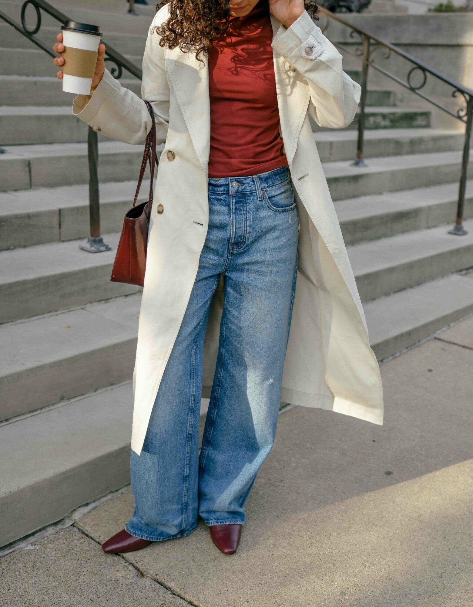 Cream Trench Coat and Red Top with Baggy Jeans for Transitional Weather — Baggy Jeans Outfits