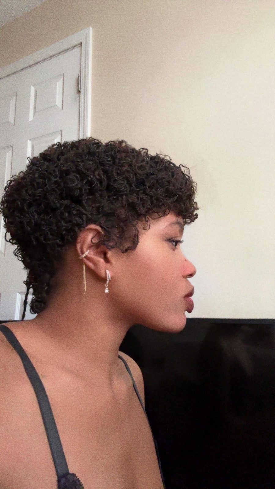 Tiny Bantu knot out held with Bobby pins pixie 'cut' on shoulder length microlocs. The back is flipped up and Bobby pinned to keep it flat and short : r/Microlocs