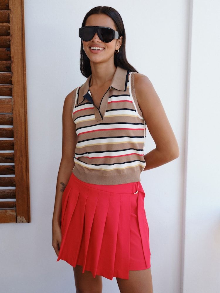 Vibrant Red Skirt: Sporty Polo and Sunglasses — Tennis Skirts