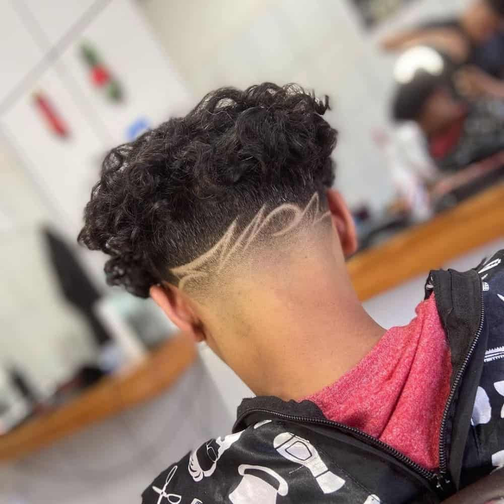 Curly Hair With Shaved Design Curly Hair With Shaved Design — High Taper Fade