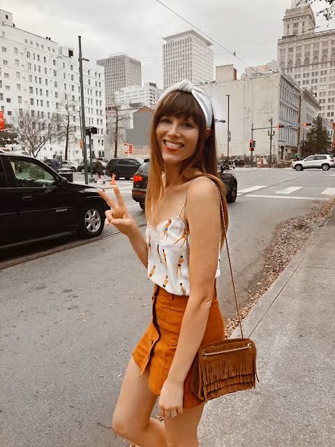 Orange Mini Skirt with Graphic Camisole and Fringe Bag Orange Mini Skirt with Graphic Camisole and Fringe Bag — New Orleans Outfits