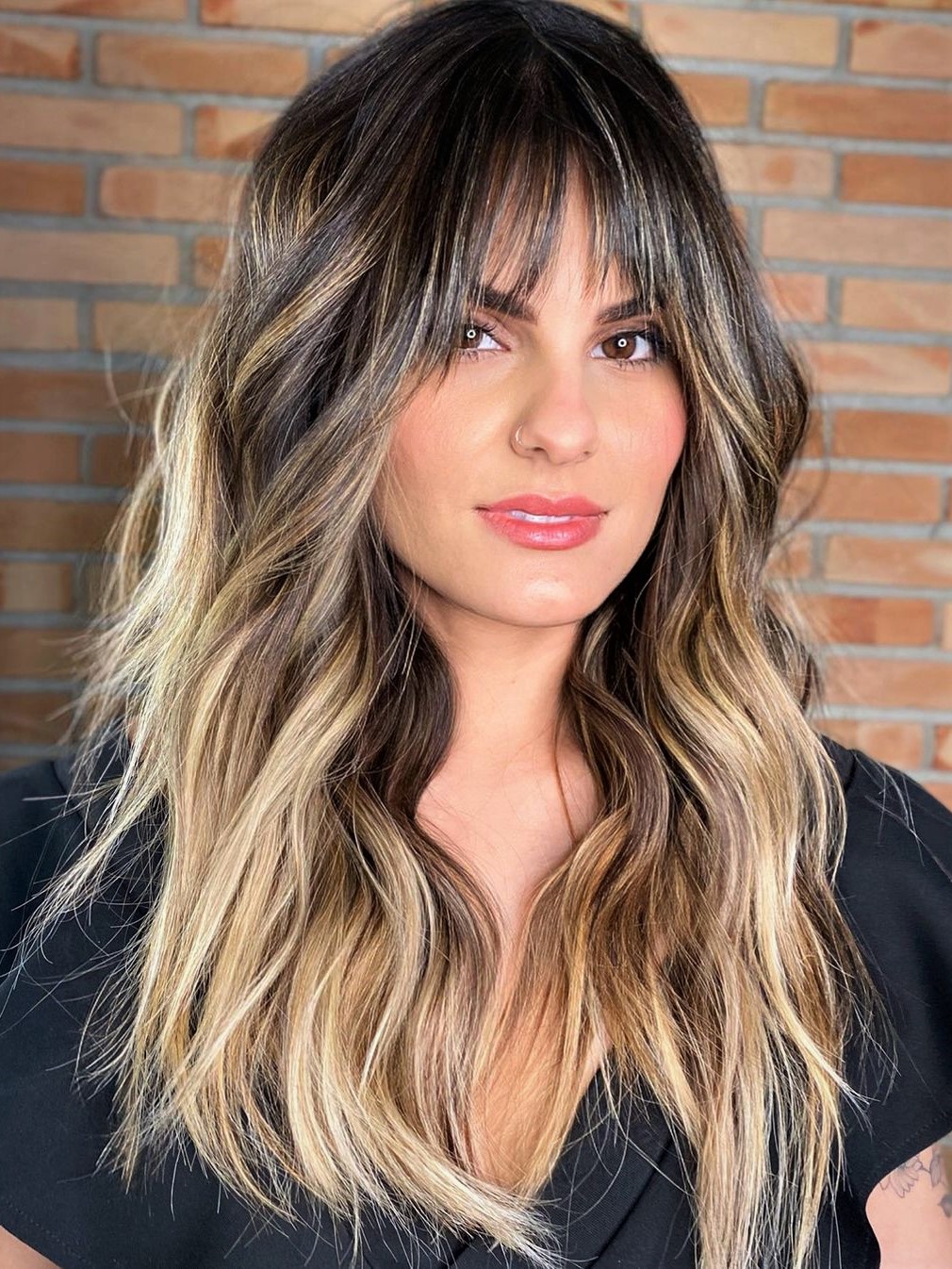 Collarbone Shag Sun-Kissed Highlights — Bangs for Round Face