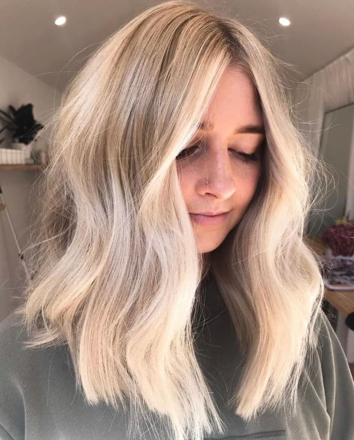 Striking Platinum Blonde Lob Striking Platinum Blonde Lob — Blonde Hair Over 40