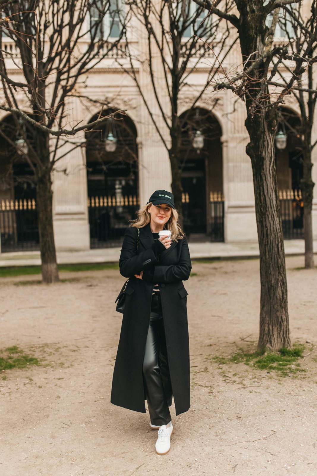 Monochromatic Black Ensemble with Crisp White Sneakers — Dressy Casual Outfits