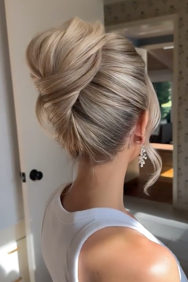 Blonde With Highlights Intricate Blonde Wavy Twist Updo Blonde With Highlights Intricate Blonde Wavy Twist Updo — French Twist