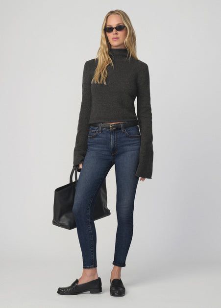 Dark Wash Skinny Jeans with a Bell-Sleeve Turtleneck Dark Wash Skinny Jeans with a Bell-Sleeve Turtleneck