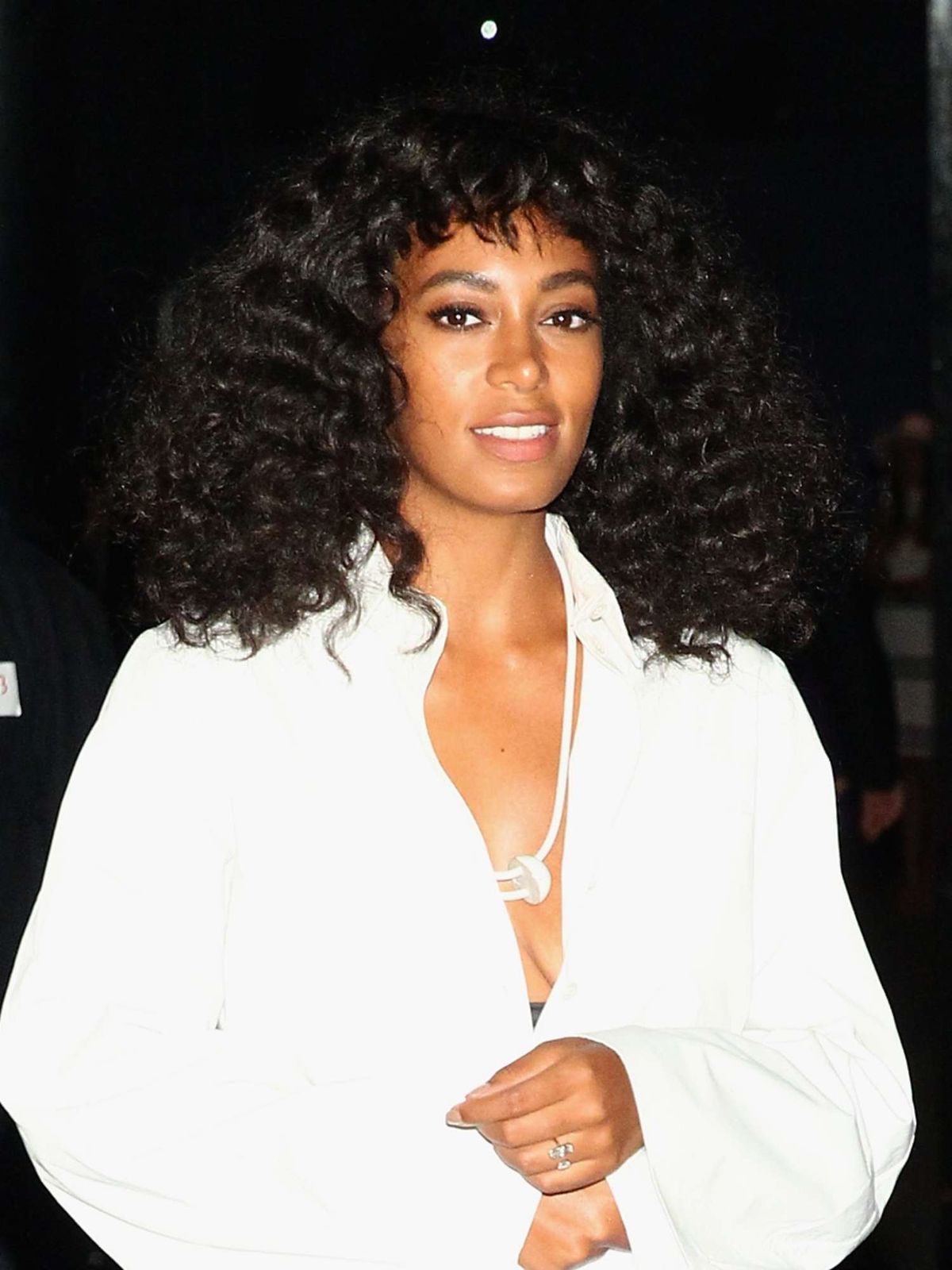 Front View Mid-Back Curly Hair With Full Bangs Blowout — Natural Hair with Bangs
