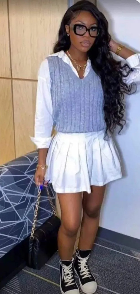 Pleated Mini Skirt with Sweater Vest and High-Top Sneakers Pleated Mini Skirt with Sweater Vest and High-Top Sneakers — Sneakers with Skirt Outfits