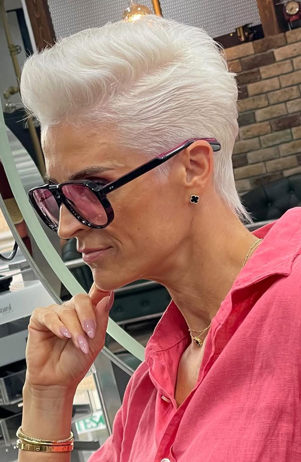 Platinum Pompadour With Short Sides — Haircuts for Women Over 50 with Glasses