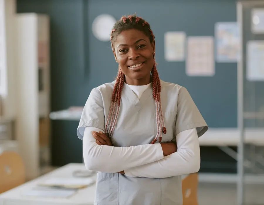 Light Grey Scrub Top Layered Over White Long-Sleeve Light Grey Scrub Top Layered Over White Long-Sleeve — Nurse Outfits