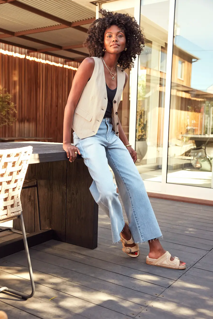 Light Blue Wide Leg Jeans with a Linen Vest and Platform Sandals