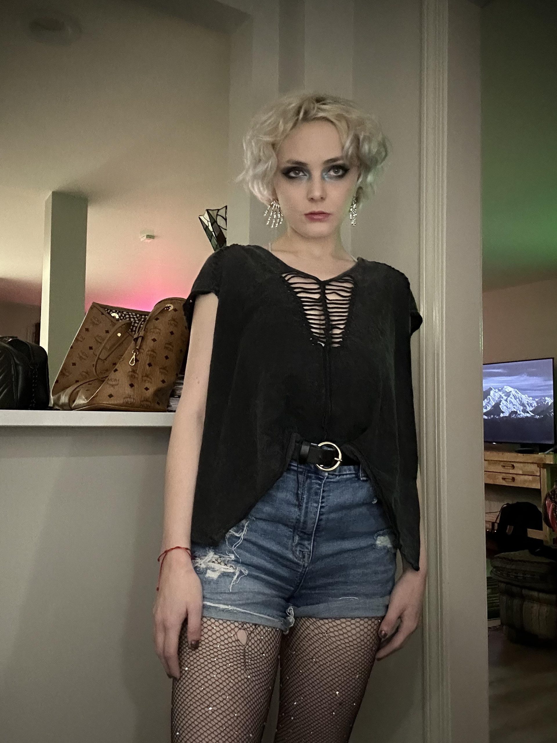 Distressed Top with Cutouts, Ripped Shorts, and Platform Boots — Indie Sleaze Outfits