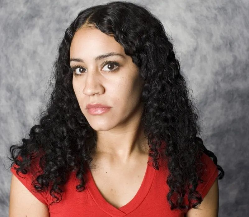 Voluminous Dark Brown Curls — Hair Color for Latinas