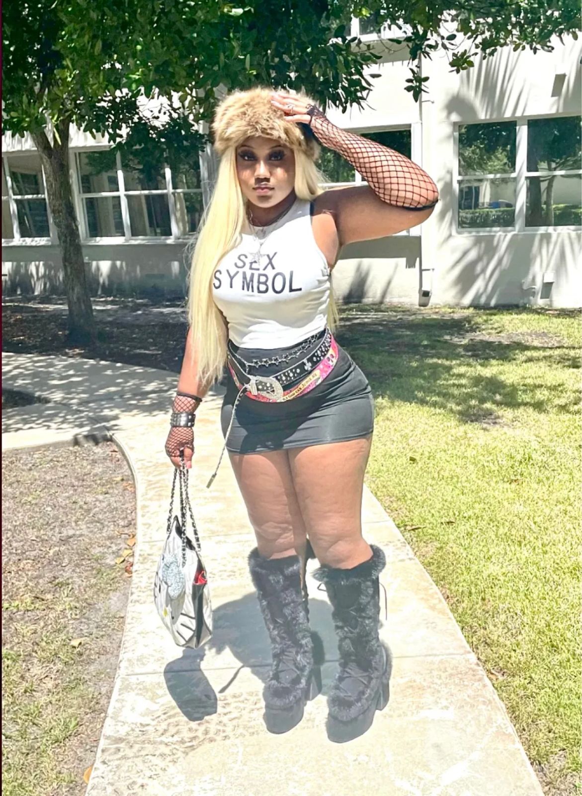 McBling Statement: Graphic Tank, Fishnets, and Fur-Trimmed Hat McBling Statement: Graphic Tank, Fishnets, and Fur-Trimmed Hat — McBling Outfits