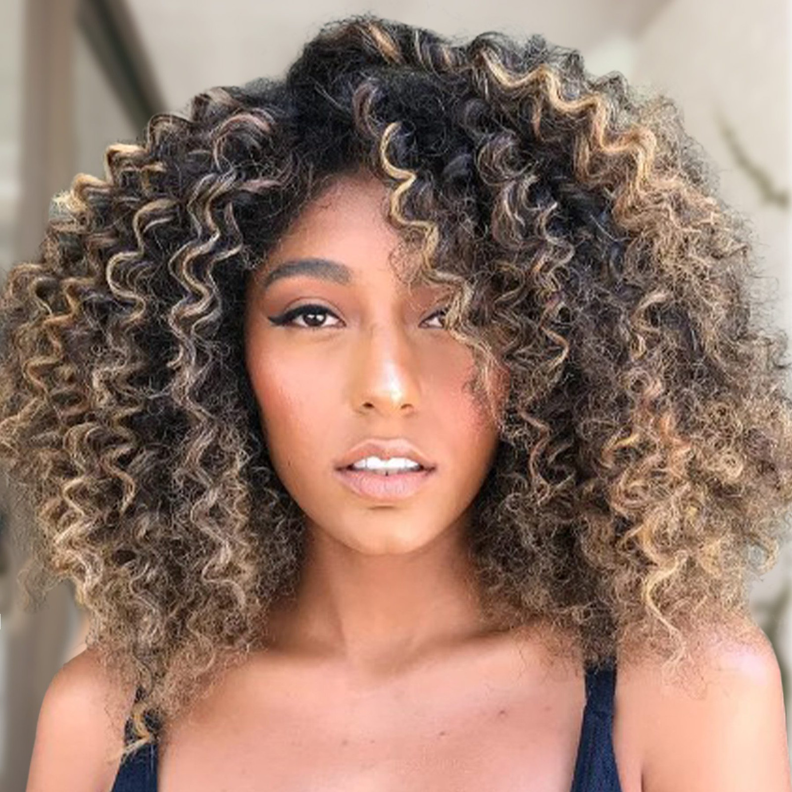 Shoulder-Length Curls with Blonde and Caramel Balayage Shoulder-Length Curls with Blonde and Caramel Balayage — Balayage on Black Women
