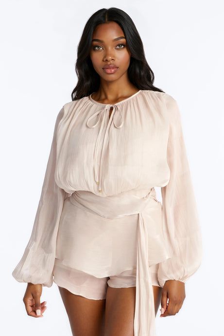 Resort Ready: Sheer Beige Romper with Voluminous Sleeves — Rompers