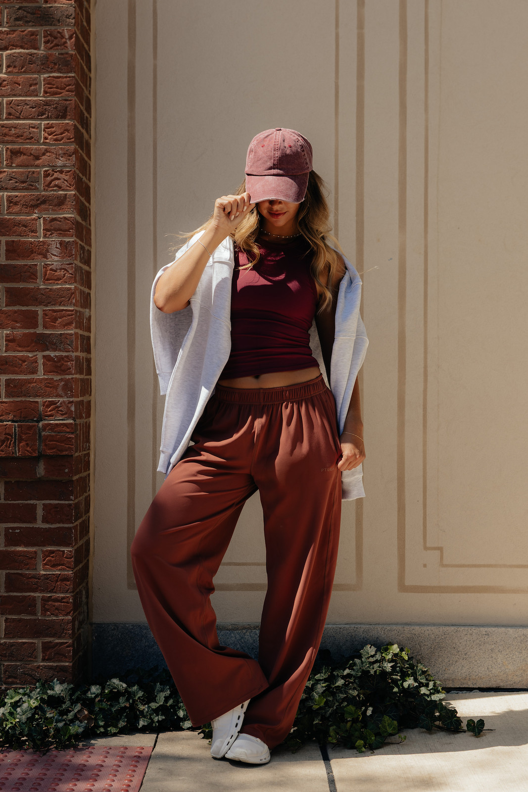 Wide-Leg Brown Pants with Maroon Tank and Draped Sweatshirt — Outfits for Athletic Build