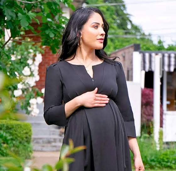 Black V-Neck Maternity Dress with Flowing Skirt Black V-Neck Maternity Dress with Flowing Skirt — Maternity Dresses