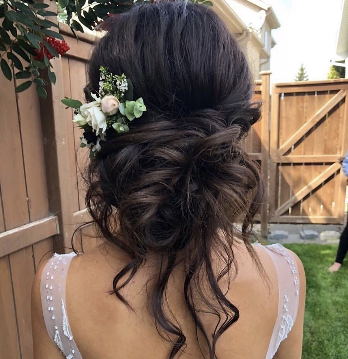 Messy Dark Brown Updo With Florals Messy Dark Brown Updo With Florals — Boho Wedding Hair