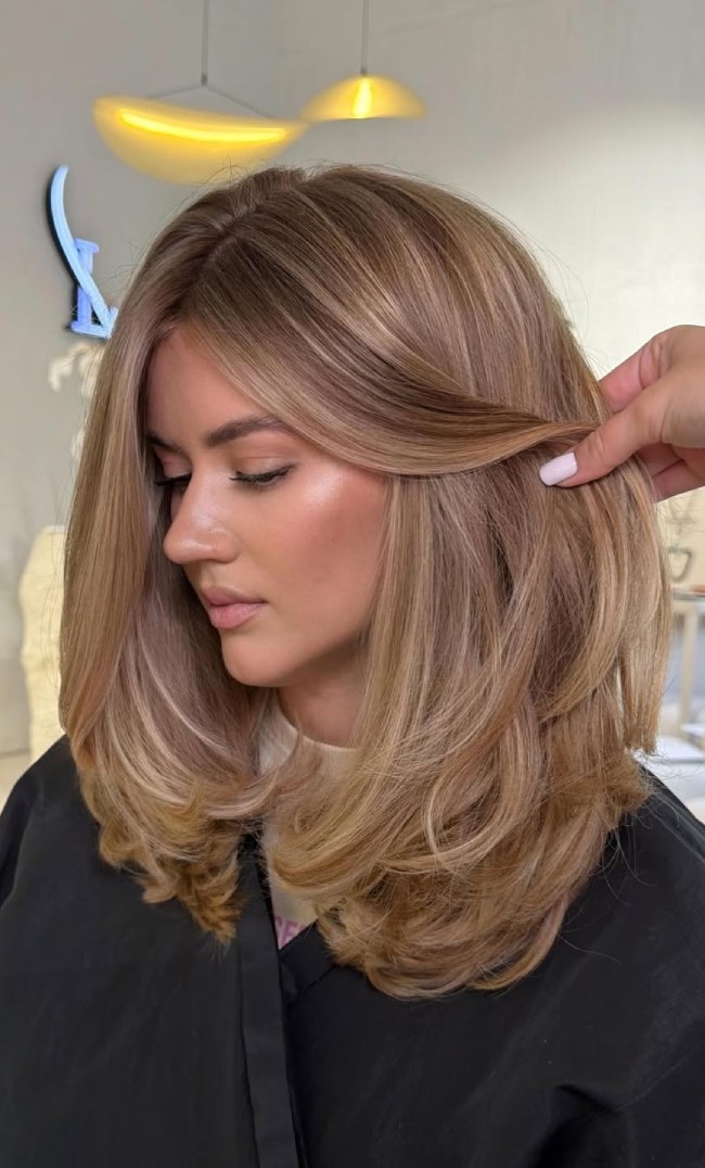 Medium Length Haircuts for Thick Hair : Soft Butterfly Layers in Warm Beige Blonde