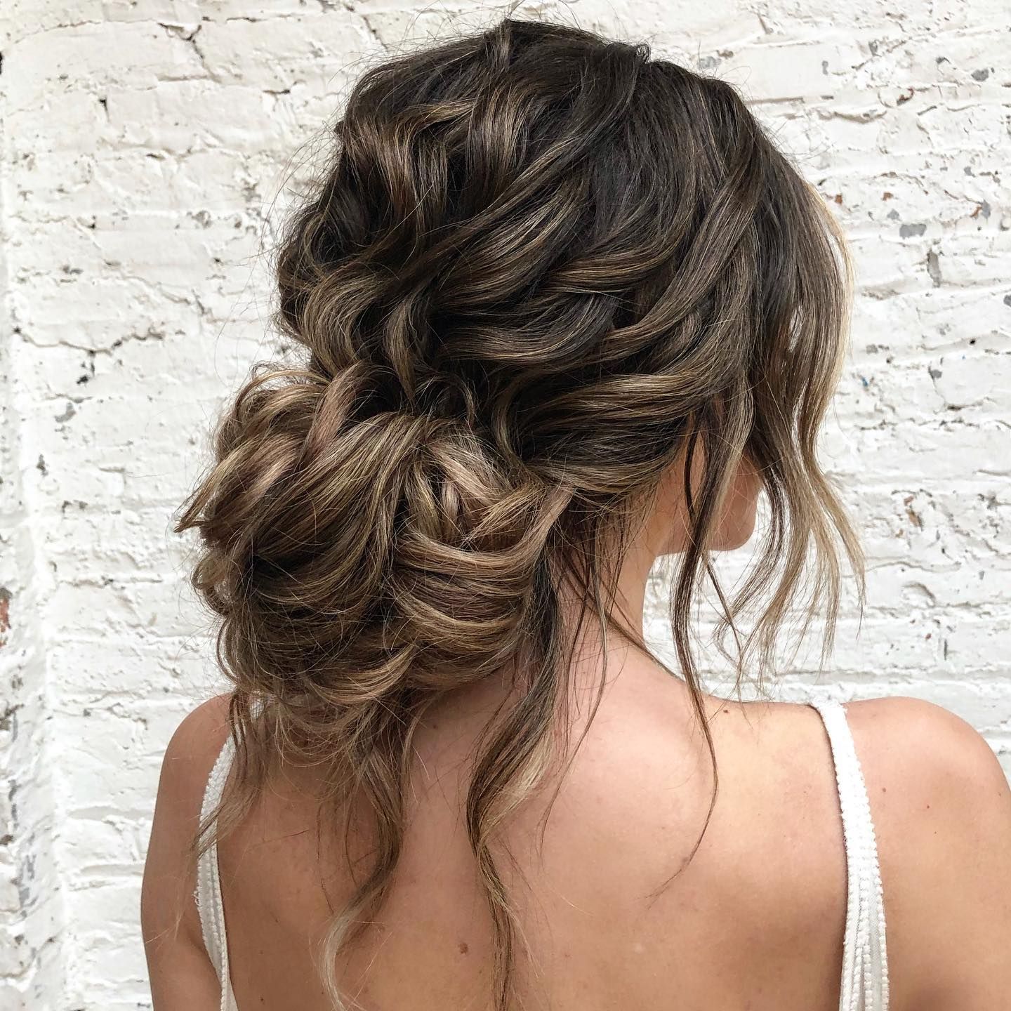 Loose Textured Dark Brown Bun with Tendrils — Wedding Low Bun