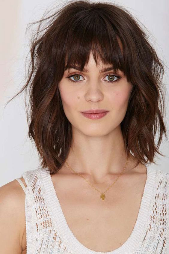 The Chin-Length Dark Brown Shag The Chin-Length Dark Brown Shag — 70s Hairstyles
