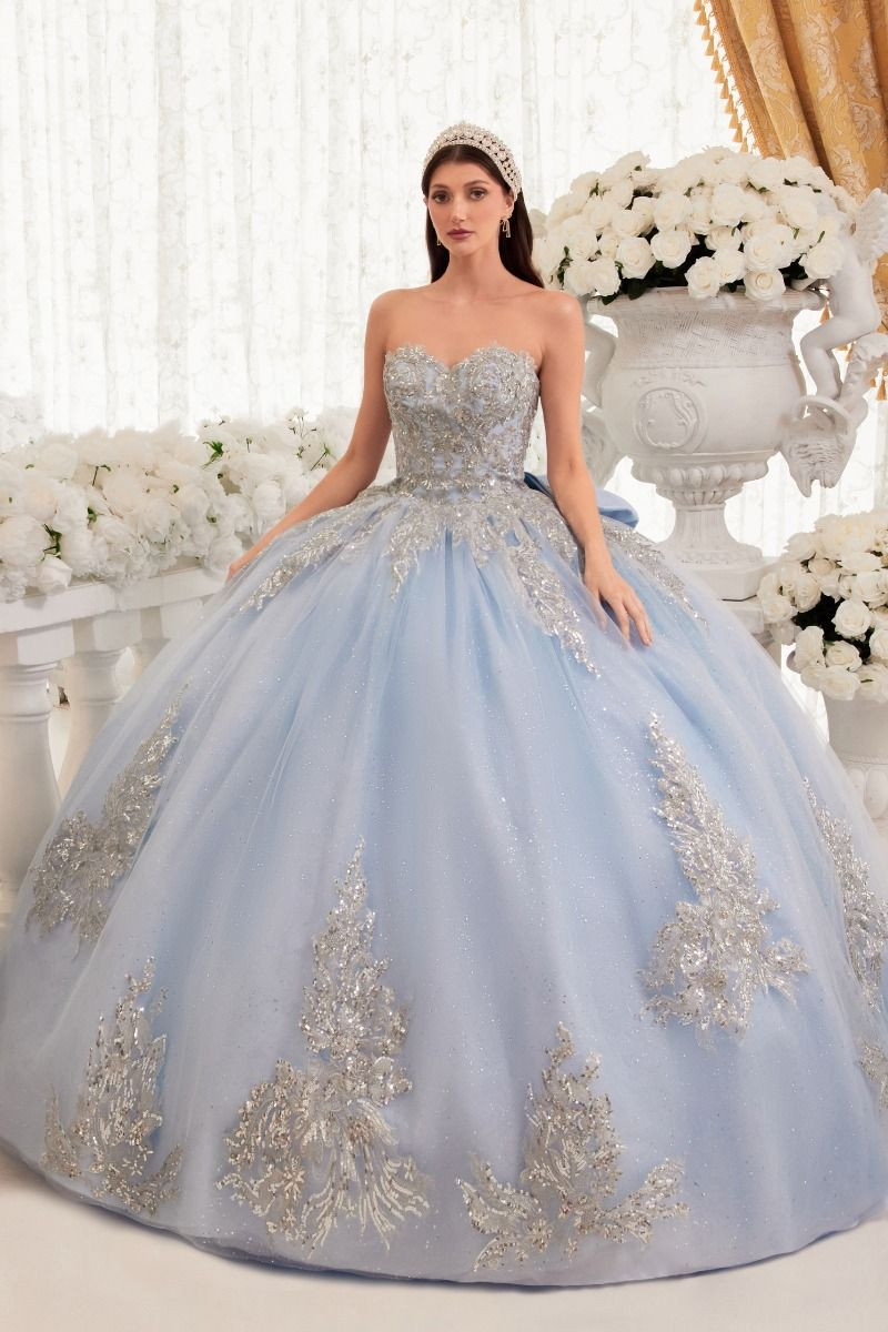Emerald Green Velvet Gown with Dramatic Ruffled Skirt — Quinceanera Guest Outfits