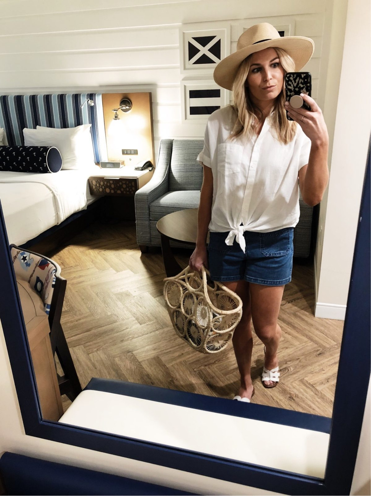 White Button-Up Shirt Tied Over Denim Shorts with Straw Hat White Button-Up Shirt Tied Over Denim Shorts with Straw Hat — Florida Outfits